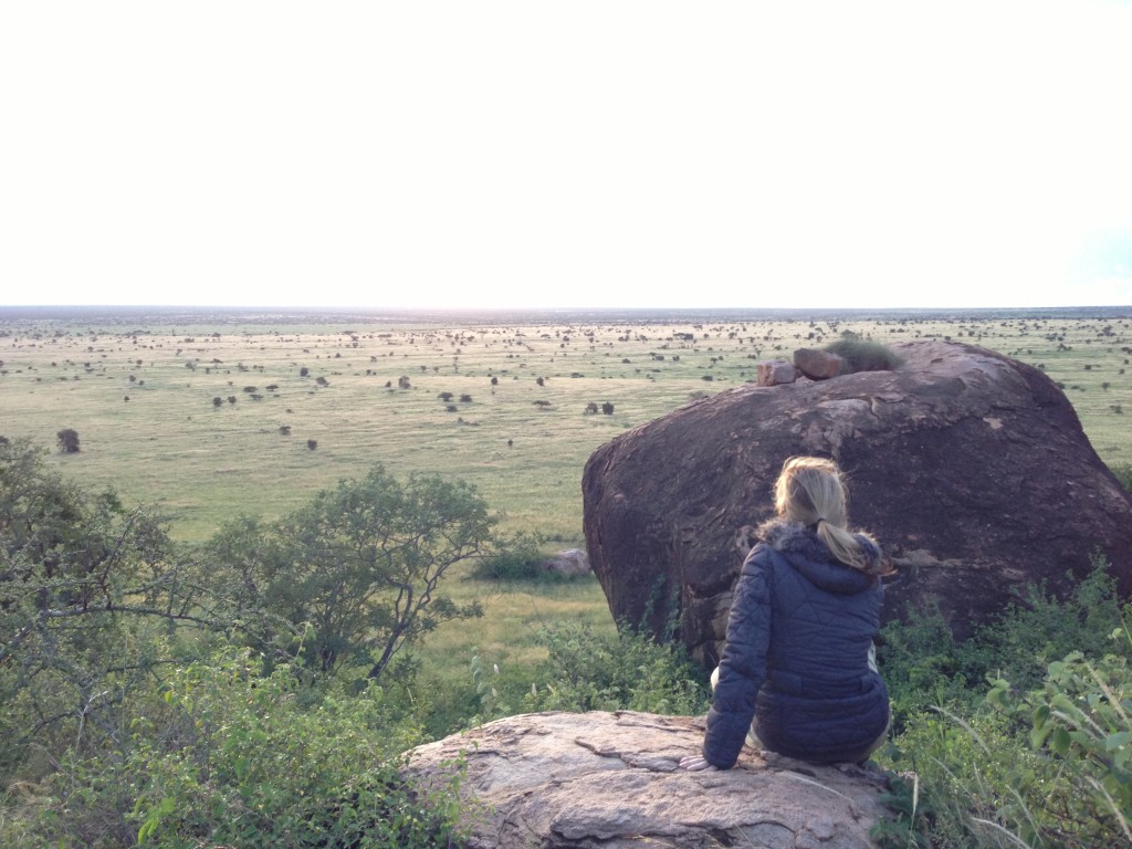 The author overlooking the plains of Chyulu Hills, Kenya (Photo: Nadya Hutagalung)
